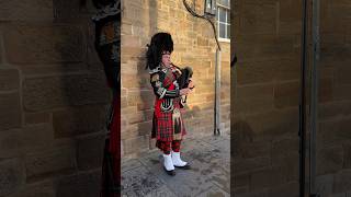 A bagpiper busking with the Great Highland bagpipe on the street in Edinburgh Scotland shorts [upl. by Nowtna]