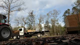 Unloading plywood with a forklift [upl. by Prospero]