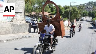 Gang coalition in Haiti spreads violence to PortauPrince neighborhood [upl. by Atikel]