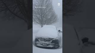 Man opens garage door to reveal heavy snowfall in New York [upl. by May]