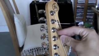 How To String A Guitar Part 1 [upl. by Stephani]