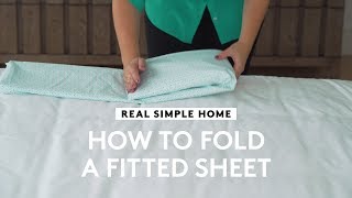 How to Fold a Fitted Sheet  RS Home  Real Simple [upl. by Courtenay]