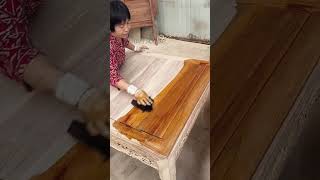 The process of brushing wood wax oil on wood table [upl. by Ayotac674]