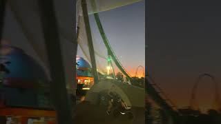 Jurassic World VelociCoaster ride over the sunset at Universal Studios Orlando Florida [upl. by Annawik]