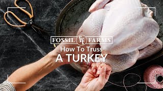 How To Truss A Turkey  Fossil Farms [upl. by Anitac]