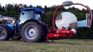 Rundballen wickeln mit Lely Attis HR16 und Landini Powerfarm 100 [upl. by Nnanaej]