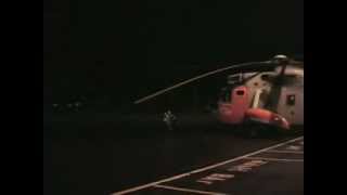 Seaking SAR helicopter being dragged in to the hanger in strong winds [upl. by Moran]