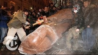 Ukraine Protest Tearing Down Lenins Statue in Kiev  The New York Times [upl. by Acinyt]