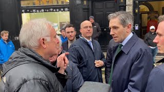 Simon Harris confronts heckler who told Taoiseach he should be ashamed of himself [upl. by Amari586]