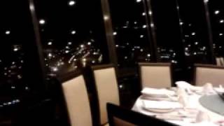 View of Singapore City Skyline from Prima Tower Revolving Restaurant Singapore  2bearbearcom [upl. by Veradia]