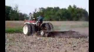 Farmall 560d with 14 McCormick disk [upl. by Nella393]