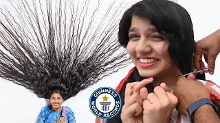 Cutting The Worlds LONGEST HAIR  Guinness World Records [upl. by Aruabea457]