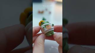 Making a frog wearing an embroidered sweater 🐸✨ polymerclay cutekeychain polymerclayartist clay [upl. by Nalat]