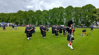 Drum Major Rennie leading Kintore Pipe Band on the march during 2024 Oldmeldrum Highland Games [upl. by Veradia523]