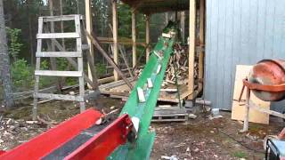 Splitting firewood straight into a shed Part 2 [upl. by Martella]