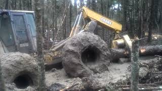 John Deere Tractor Gets STUCK in the MUD in Unbelievable Way [upl. by Ahseinar]