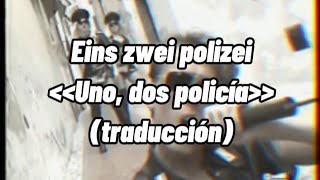 Eins zwei polizeiMoDotraducción al español [upl. by Eberta]