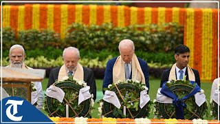 G20 Summit Glimpses of world leaders delegates paying tributes to Mahatma Gandhi at Rajghat [upl. by Enaitsirk]