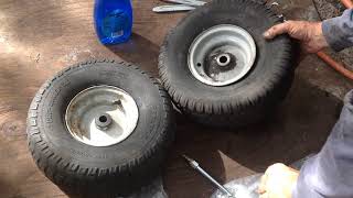 Installing inner tubes in lawn tractor tires [upl. by Gunter254]