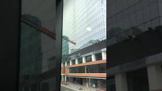 Edmonton window washer on swing scaffolding on the outside of Stantec building Safety at work [upl. by Garibold516]