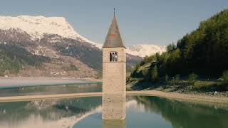 Breathe in breathe out Reschensee  Lago di Resia  Reschensee Lake Südtirol [upl. by Ruddy]