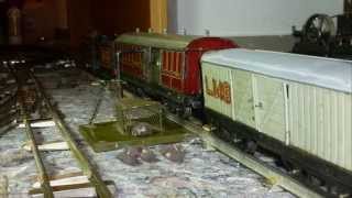 Vintage tinplate 0 gauge Working BassettLowke Travelling Post Office in action [upl. by Stander]