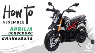 Aprilia Dorsoduro 900 Licensed Motorbike 12v Kids Electric Ride On Bike Assembly Instructions [upl. by Eintroc395]