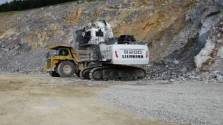 Liebherr R9200 front shovel loads Komatsu HD 785 dumptruck [upl. by Frodi]