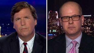 Tucker vs critic who calls him cheerleader for Russia [upl. by Amand]