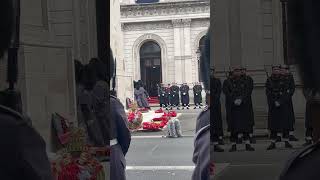 The layers of wreath and the Marching at the Remembrance Day event [upl. by Rehpotsrhc]