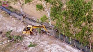 New Video Expert Operator Excavator Trees Soils Into Water Mud Of Landfilling [upl. by Ataeb618]