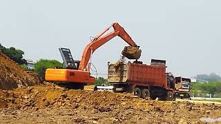 EXCAVATOR AND DUMP TRUCK CONSTRUCTION GRADING LAND [upl. by Kiley]