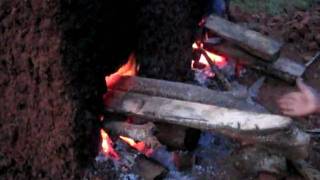 Firing clay bricks brickmaking in Kampala Uganda in homemade kiln [upl. by Ayo]