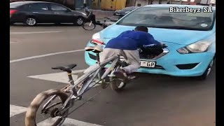 Bike spinning in a busy road in Soweto Lufhereng [upl. by Aloysius]