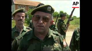 KOSOVO SERB TROOPS BEGIN WITHDRAWING [upl. by Noseyt]