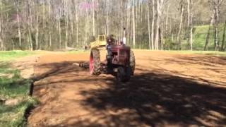 Farmall M pulling a disk and drag [upl. by Melisande356]