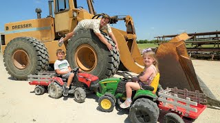 Playing in the rocks and hay with tractors  Real tractors on the farm  Tractors for kids [upl. by Lahcim885]