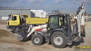 TEREX TLB890 backhoe loading TATRA truck [upl. by Sabsay]