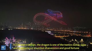 Drones in dragon formation illuminate Nanning to welcome the Year of the Dragon [upl. by Inessa]