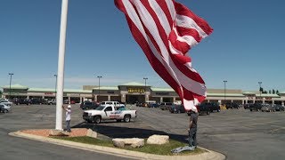 Raising a Large Flag on a Steel Crank Flagpole [upl. by Nnybor]