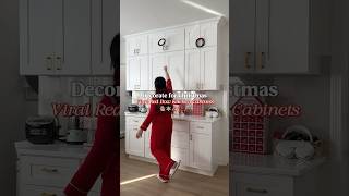 Decorate my kitchen cabinets viral red bow christmas kitchencabinets christmasdecor redbow [upl. by Gertruda]