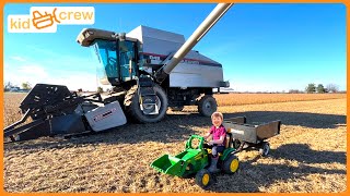 Harvesting crops with kids power wheel tractor amp real combine harvester farm Educational  Kid Crew [upl. by Nadnerb]