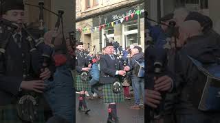 Vale of Atholl Pipe Band march out playing Wings for 2024 Pitlochry New Year Street Party shorts [upl. by Derayne556]