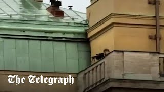 Brave man shouts shoot here you fer in bid to distract Prague shooter from targeting students [upl. by Avirt]