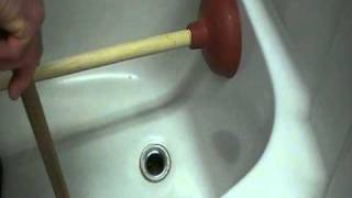 How to Unplug or clear a bathtub drain Easily [upl. by Kilah]