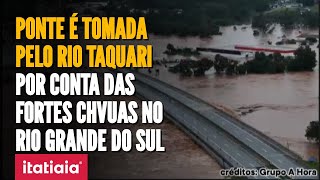 CHUVAS NO RS IMPRESSIONANTE PONTE É COBERTA PELO RIO TAQUARI EM LAJEADO VEJA AS IMAGENS [upl. by Formenti840]