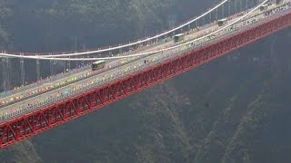 THE AIZHAI SUSPENSION BRIDGE IN CHINA [upl. by Alikahs785]