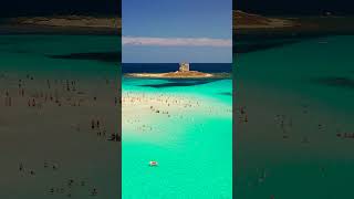 Il Gioiello Blu di Stintino quot La Pelosa dipinta di Blu quot  4K  Sardegna World [upl. by Gwenneth937]