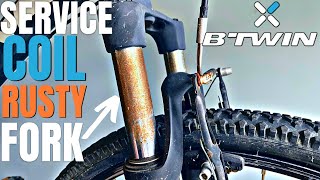 HOW to MTB SUSPENSION FORK SERVICE  Btwin BIKE COIL shock fork repair [upl. by Ssej133]