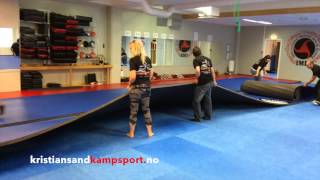 Setting up the new Dollamur mats Kristiansand Kampsport Senter Norway 2014 [upl. by Donahue122]